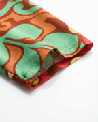 Abito estivo curvy in viscosa fantasia floreale arancio/verde – mezza manica, lunghezza caviglia